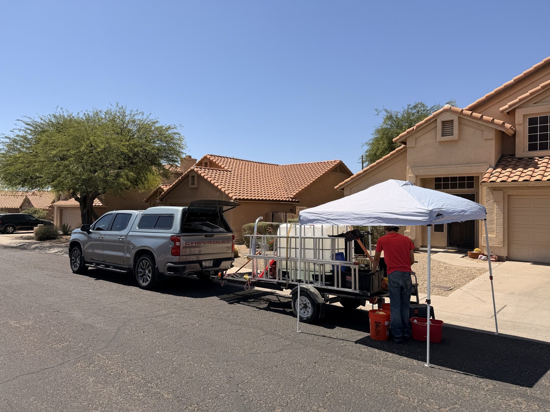 REBEL truck, trailer, and equipment set up for a job in the Phoenix Valley