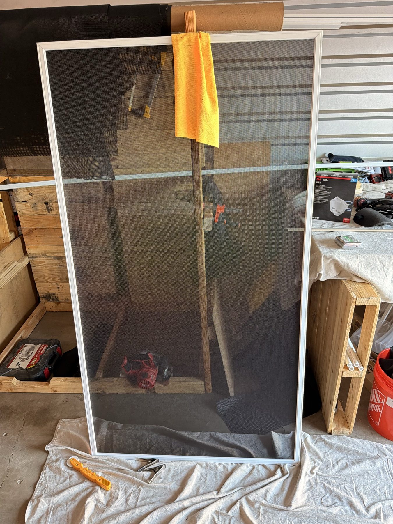 REBEL crew rescreening a window frame