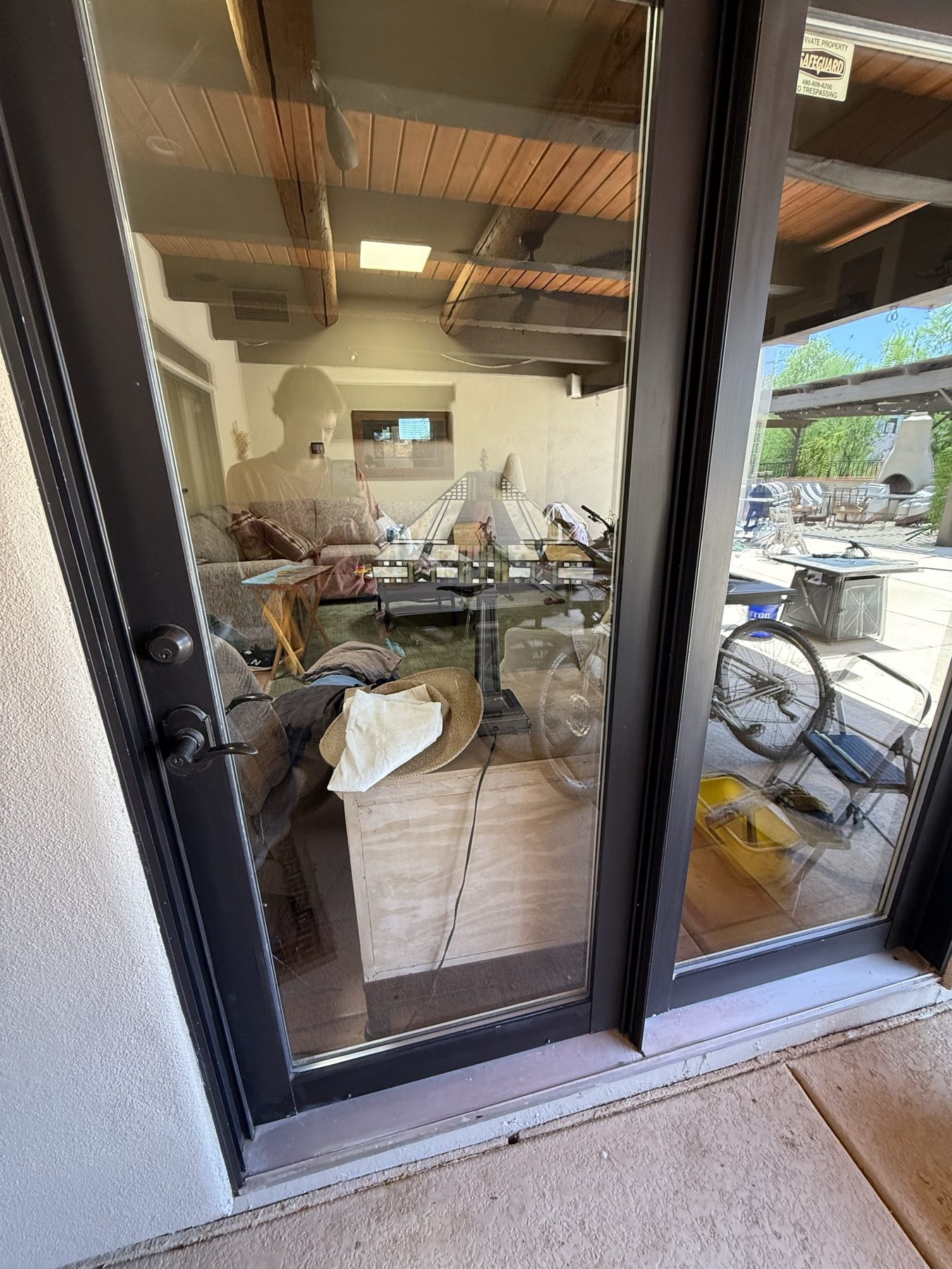 The same patio door crystal clear after REBEL window cleaning