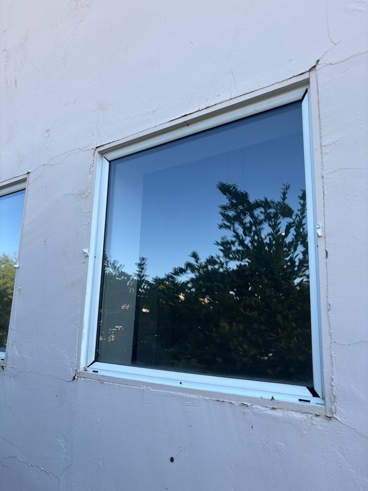 The same window with a clean frame and track after REBEL service