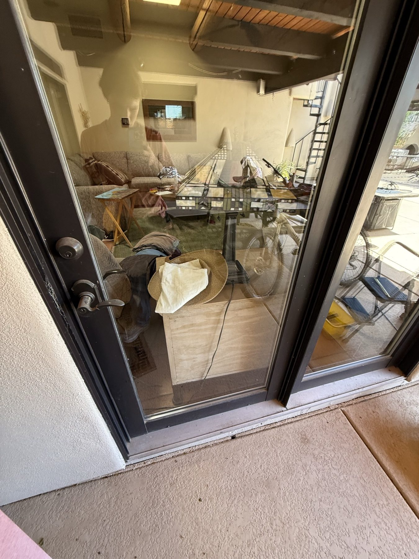 Patio door glass coated in dust before cleaning